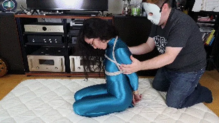 Hollyrope Omega - Submissive cutie Khrystal in blue bodysuit (that looks like the suit from Metroid, btw) gives herself to her master to be bound, gagged and blindfolded
