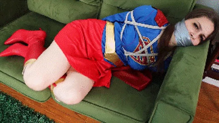 Hollyrope Omega - Mina Salome is Supergirl her secret identity has been exposed and she is humiliated all tied up and wraparound tape gagged
