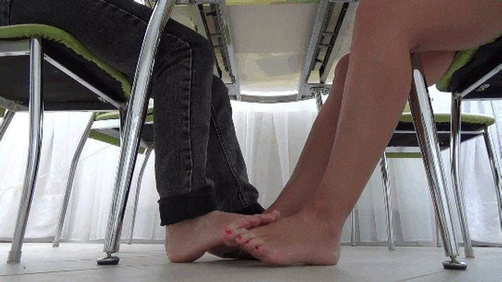 Story Of Alice - Footsie barefoot of 2 pairs beautiful legs under table Fa