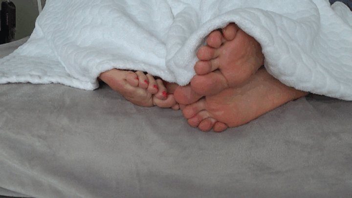 Story Of Alice - Intertwining toes under the blanket A a