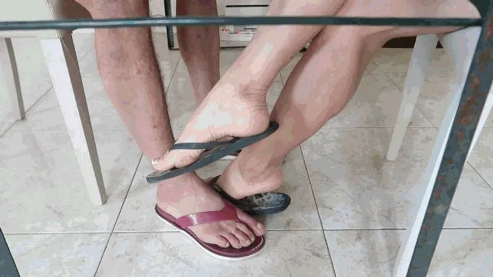 Princess Of Volcanoes - Two people in flip-flops at a table AVI